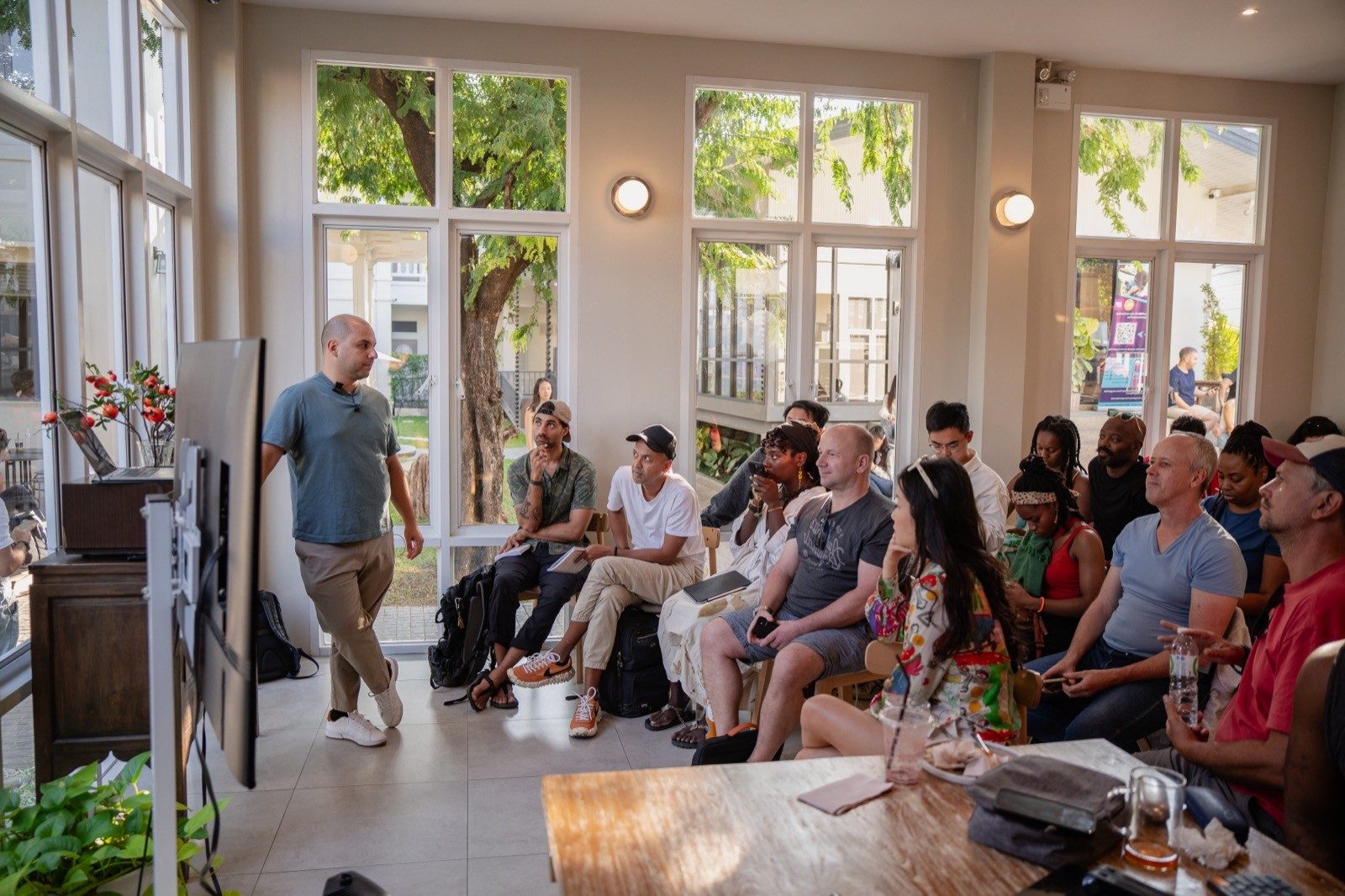 Ruben speaking to a seated room at Nomad Summit Chiang Mai, 2026