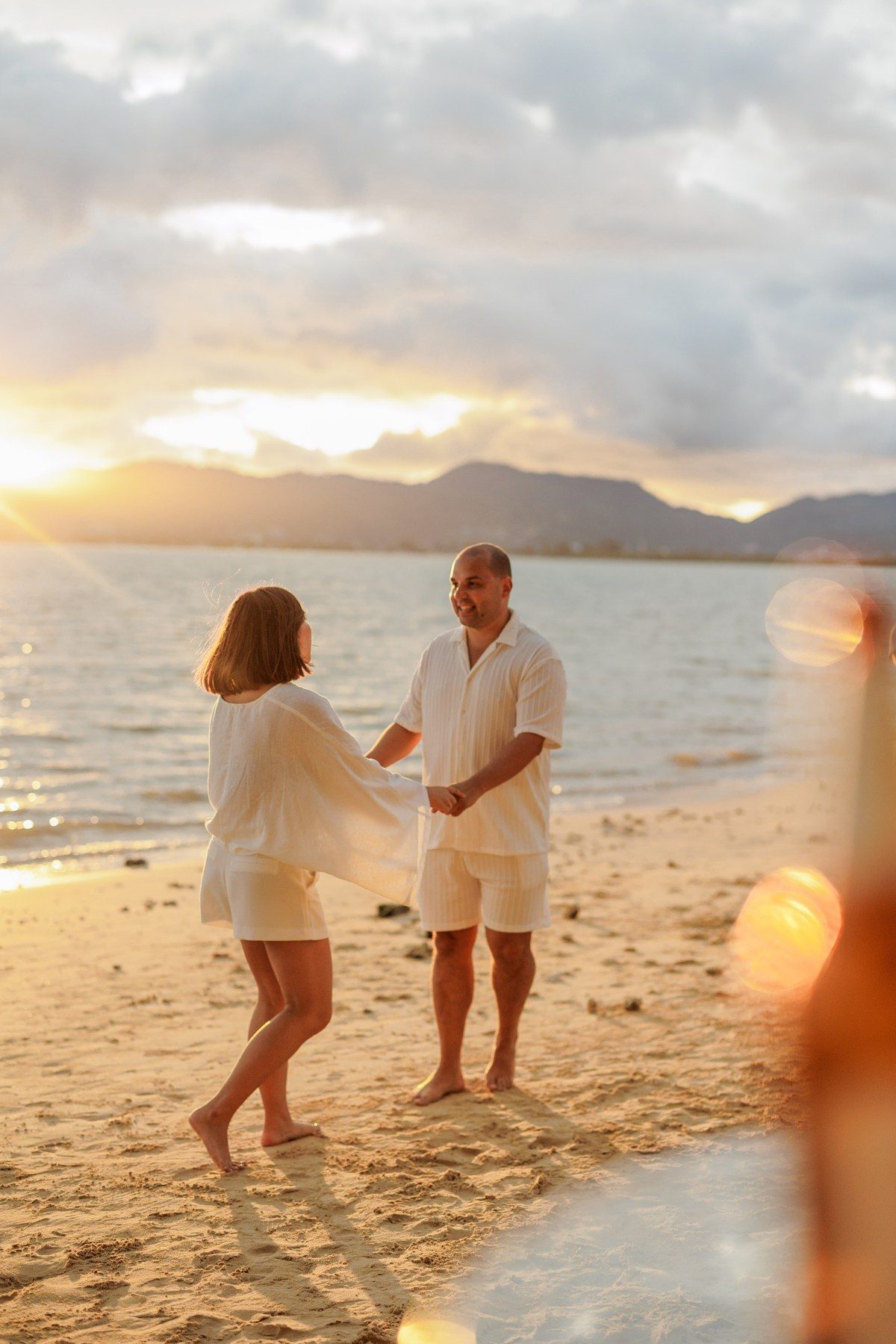 Ruben and Toon on the beach at sunset on their wedding day in Thailand